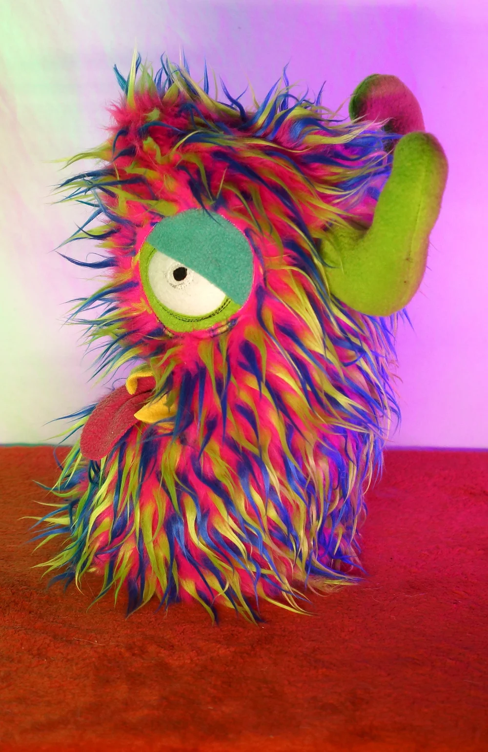 LARGE MULTI COLORED TWO EYED MONSTER WITH HORNS & POCKET MOUTH